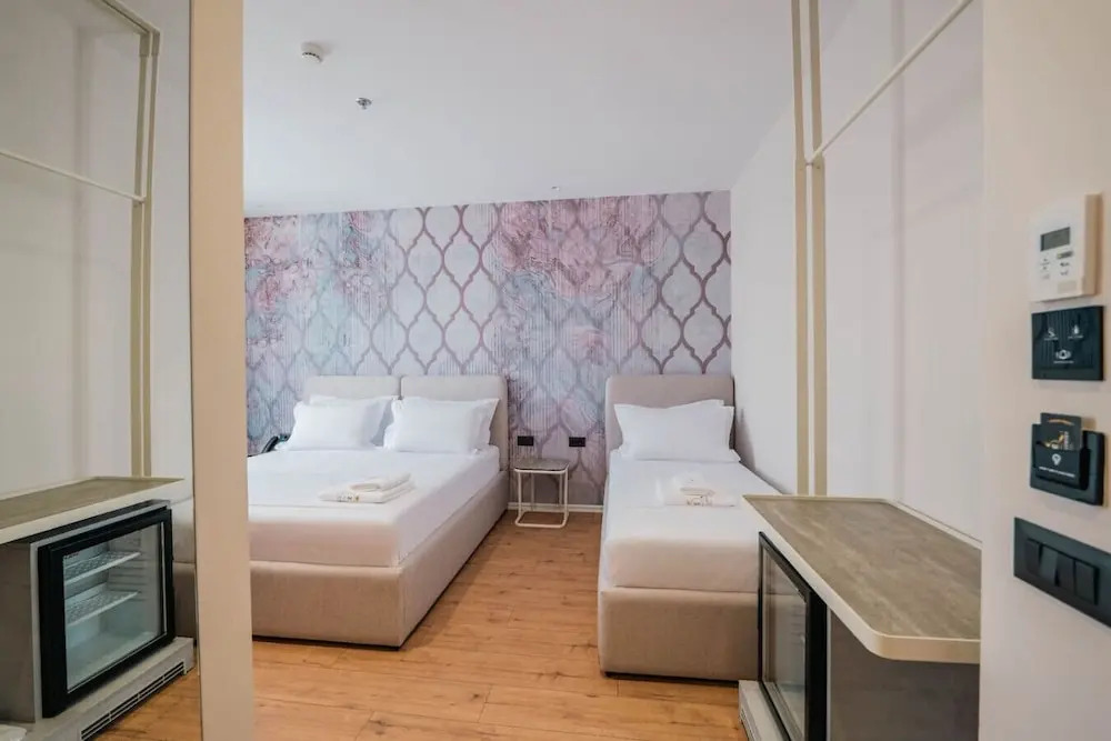 Ermes Deluxe Triple Room