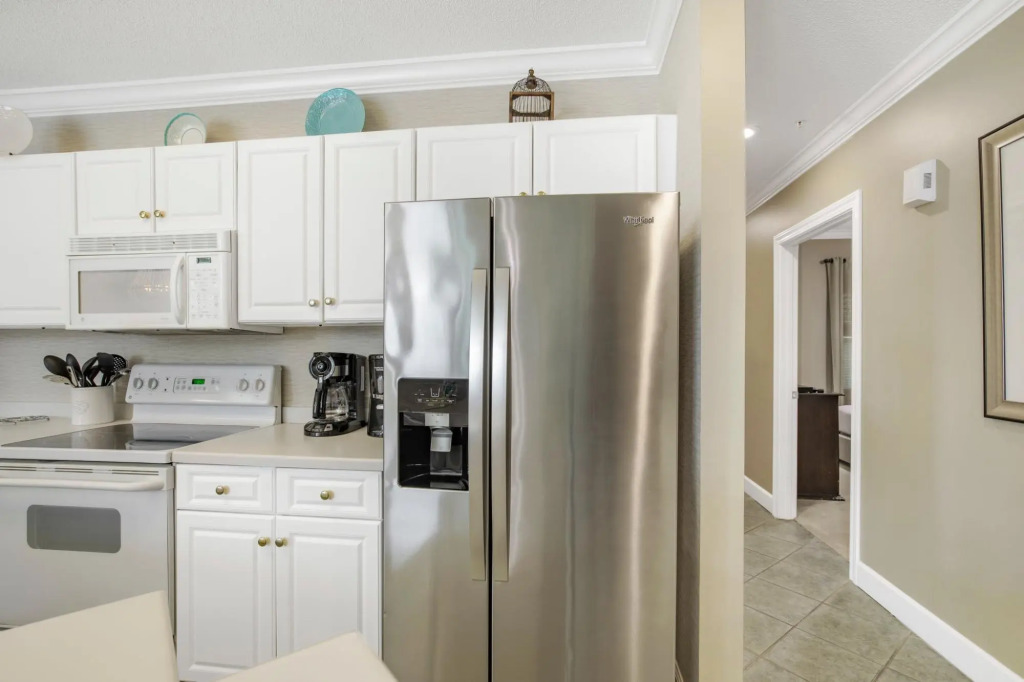 Condo on bay with boat launch and multiple pools