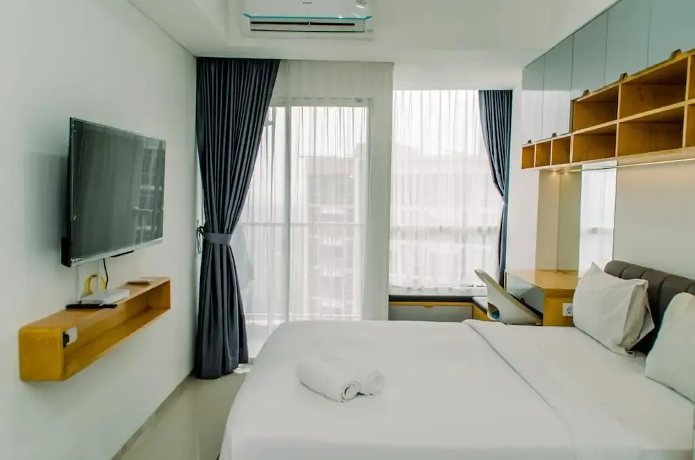 Nice and Elegant Studio near Campus at Pacific Garden Alam Sutera Apartment By Travelio
