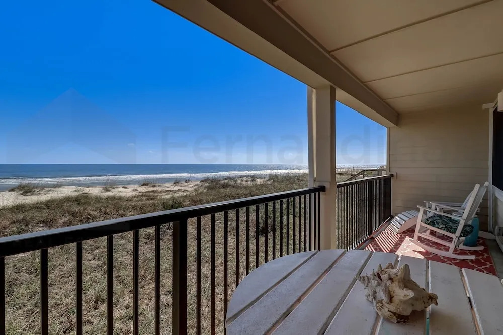 Beach Style Condo Includes Google Mini Home And Beach Access 2 Bedroom Condo by RedAwning