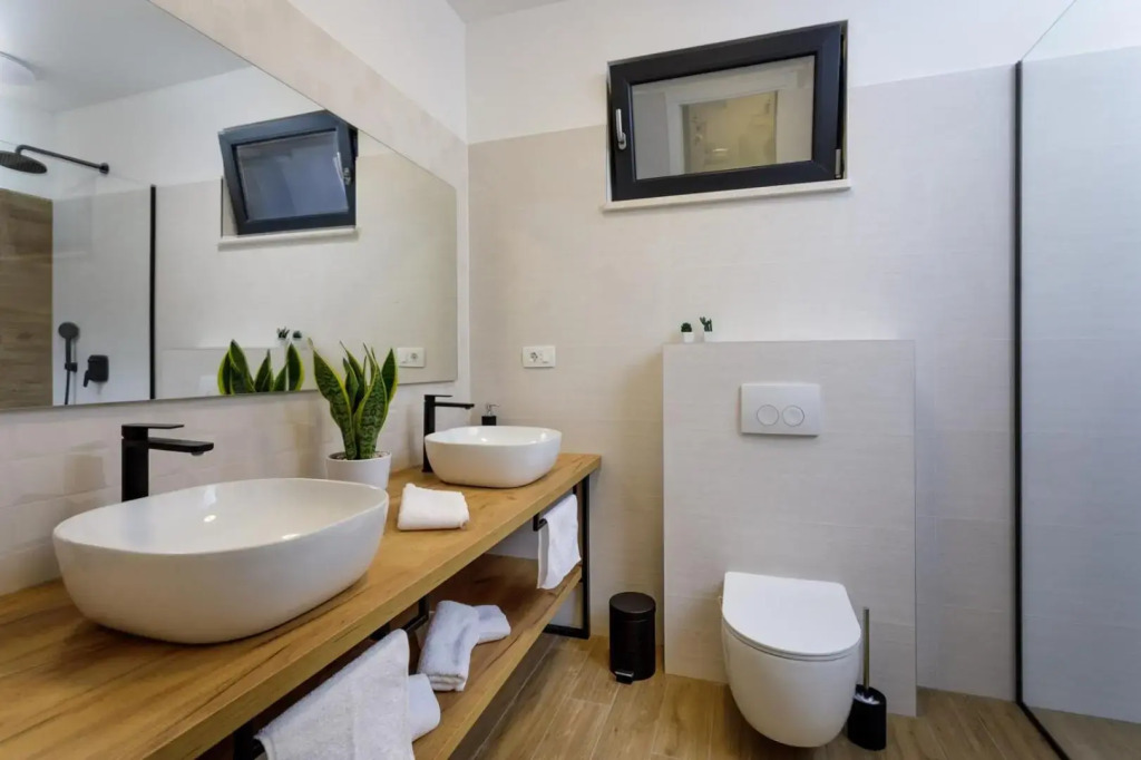 Modern Villa Elia with 40sqm heated pool, 3 bedrooms, and Split city views