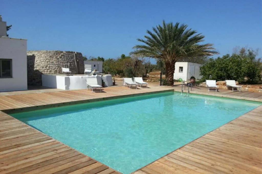 Typical property with swimming pool completely surrounded by secular olive trees and Mediterrean maq-VILLATRULLO MELOGRANO