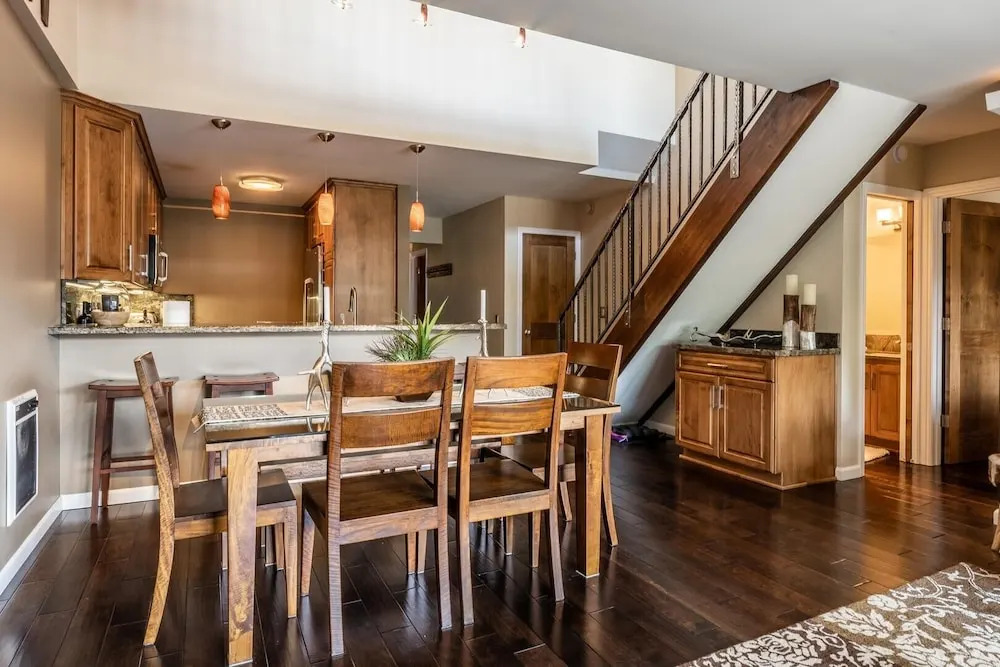 DELUXE SLOPESIDE Condo with 4th FLOOR VIEWS, Elevator and Underground Parking at Canyon Lodge (1849 Condos 409) by RedAwning