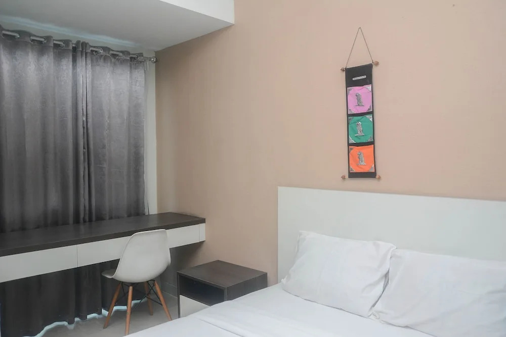 Minimalist and Comfy Studio at Grand Dhika City Apartment By Travelio