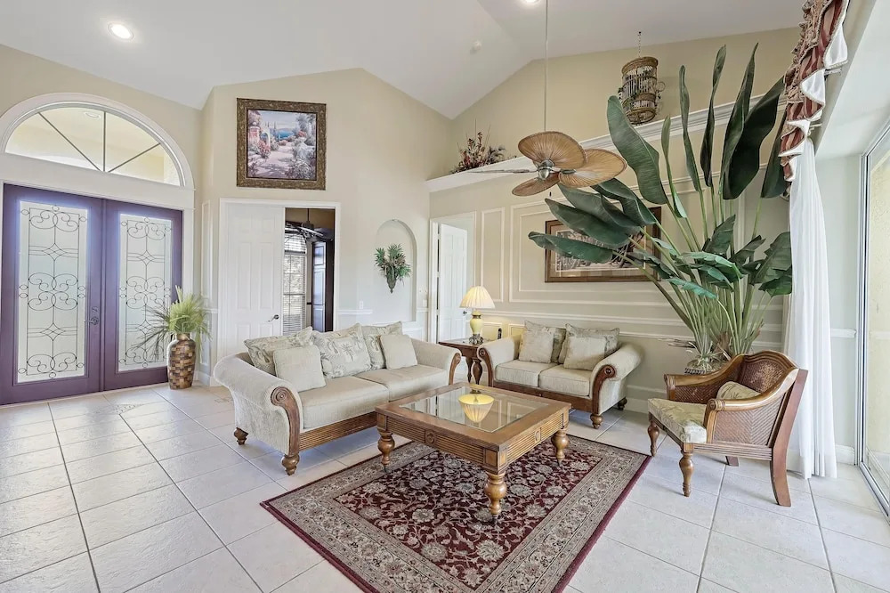 Large waterfront home with all-day sun on pool