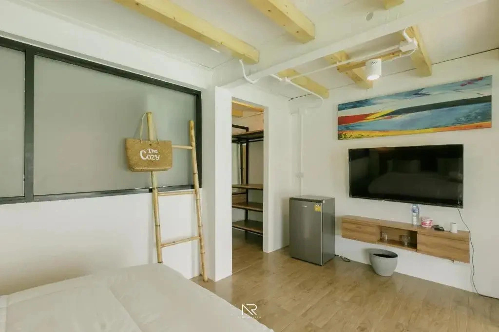 Отель The Cozy Beach Front
