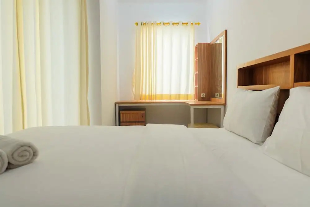 Brand New Compact Studio The Nest Puri Apartment By Travelio
