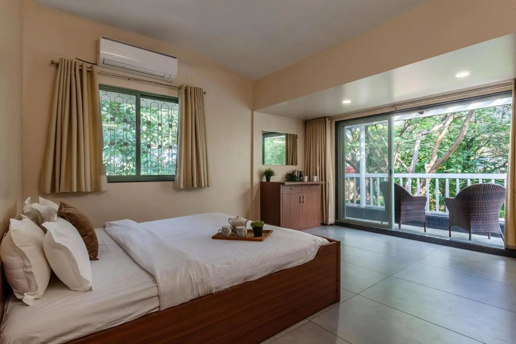 Morning Dew Retreat by StayVista - Modern interiors, Indoor games, Lush greenery, Pool & Gazebo await your escape