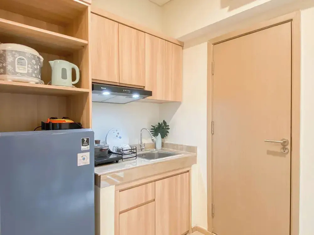 Warm Minimalist Studio Apartment Near Paramadina University At Meikarta