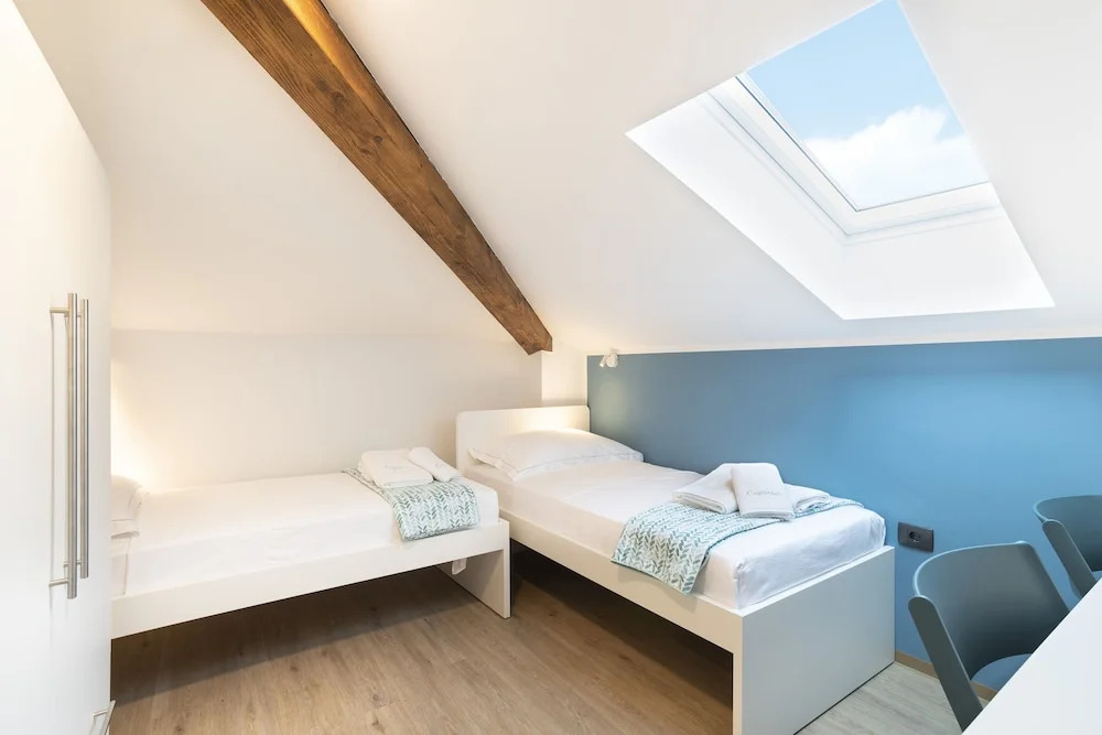 CAPRARIA appartments in historic center, with private parking