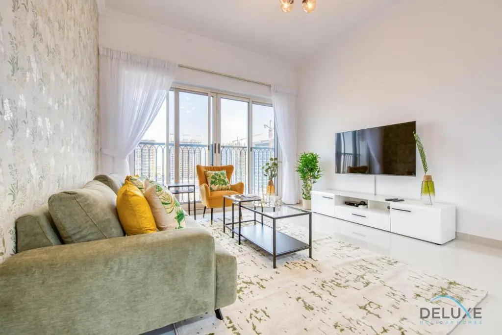 Sunny 1BR at Canal Residences West Dubai Sports City by Deluxe Holiday Homes