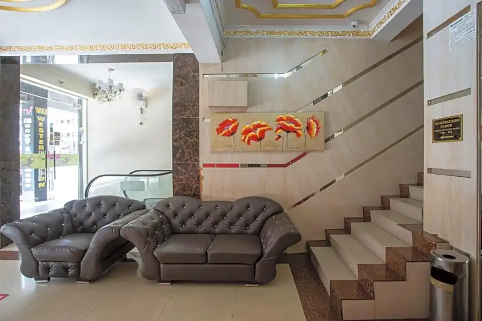 Capital O Hotel Grand Orchard
