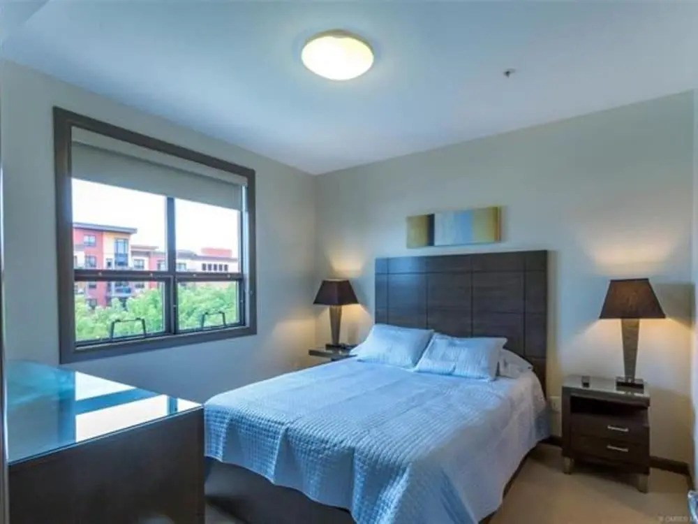 Bright Corner Unit with Lake and Pool Views #543