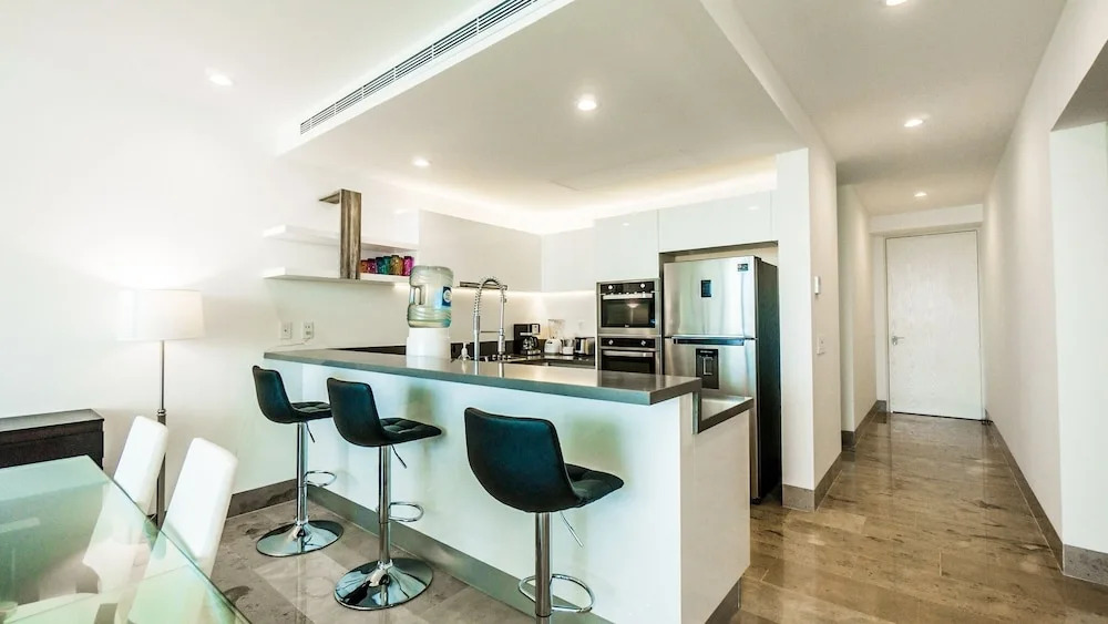 Contemporary Design Oceana 422 Playa del Carmen Condo by RedAwning