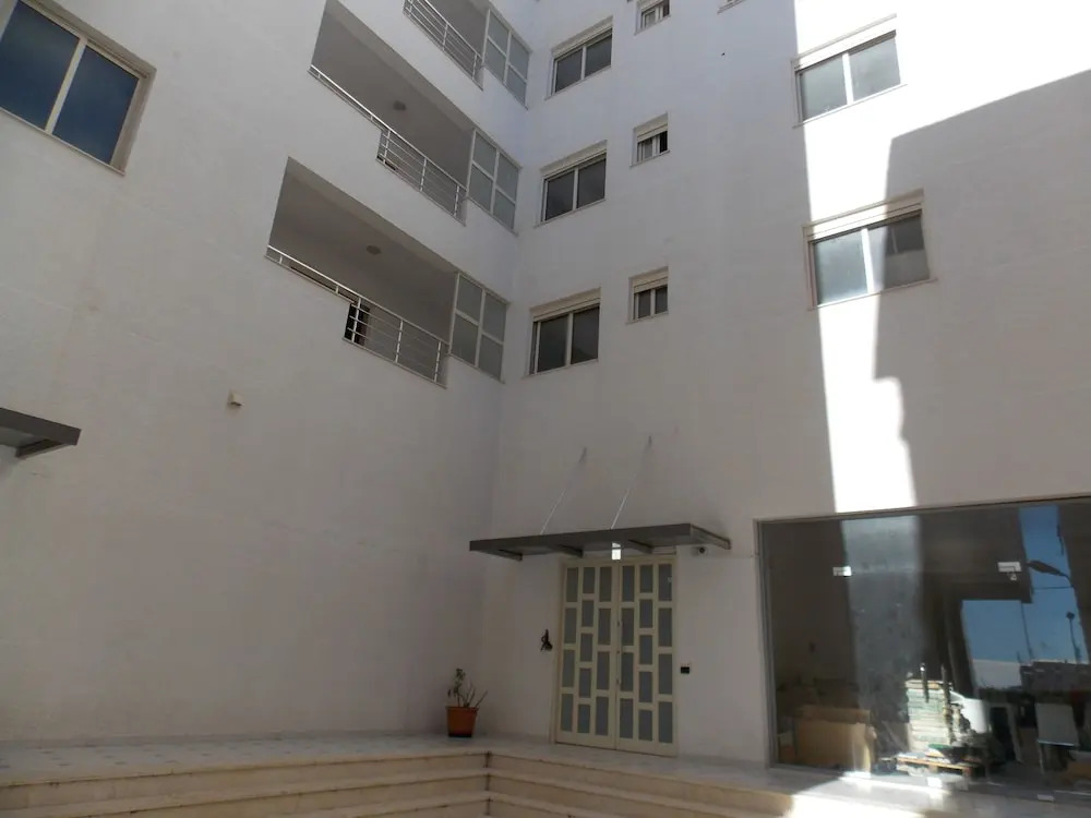 White Deluxe Apartments