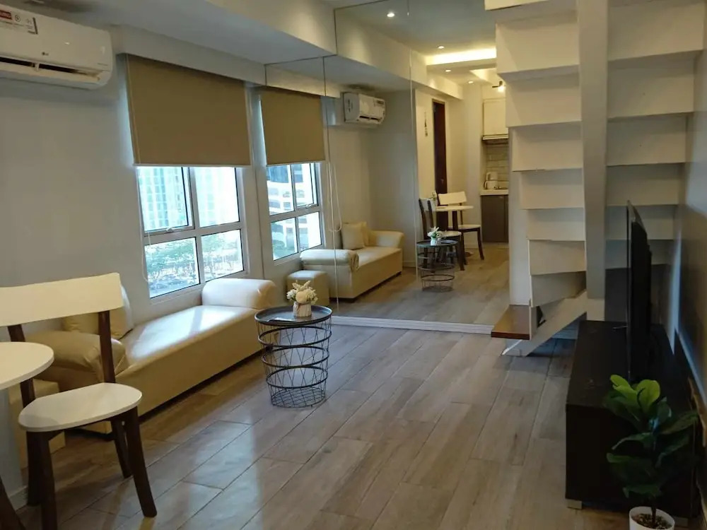 Cozi Modern Loft Suite near high street BGC wifi pool