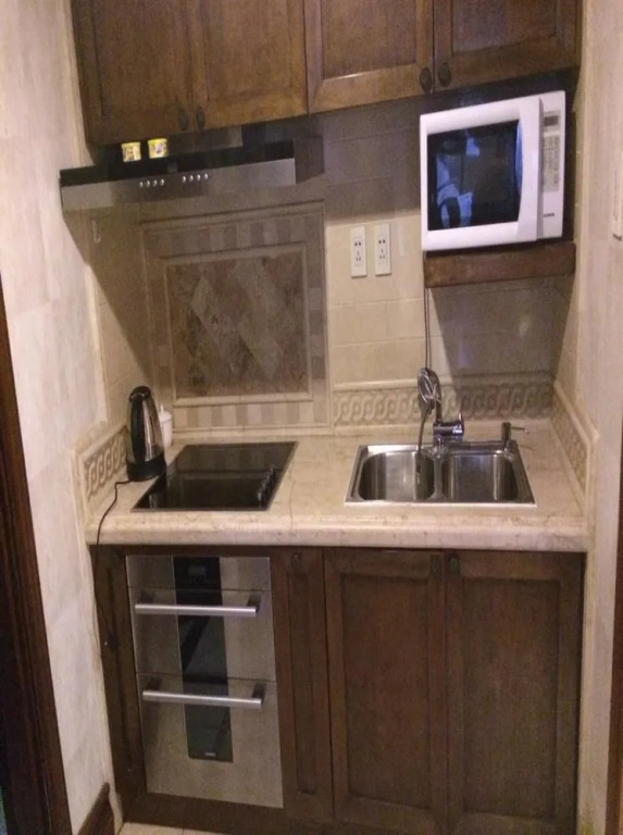 Fangfei Holiday Apartment Hotel