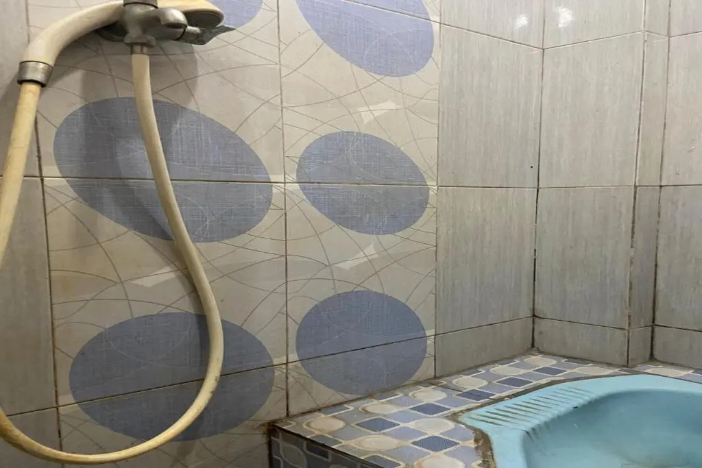 SPOT ON 91623 Pj Guest House Syariah