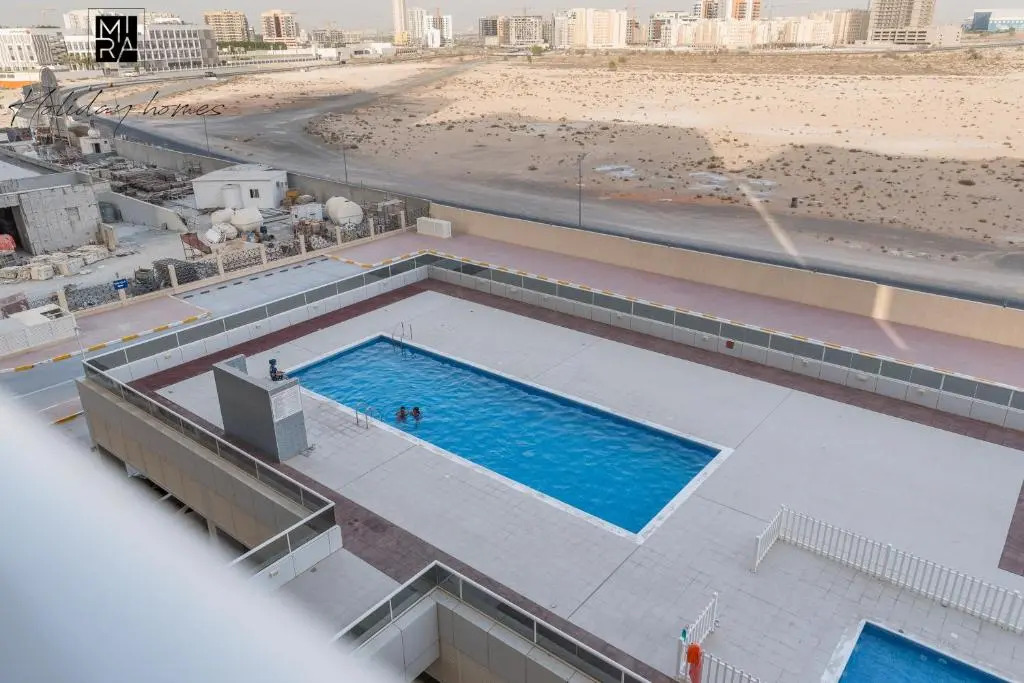 Mira Holiday Homes - Beautiful Studio - WIFI&Pool -7 min to Global Village