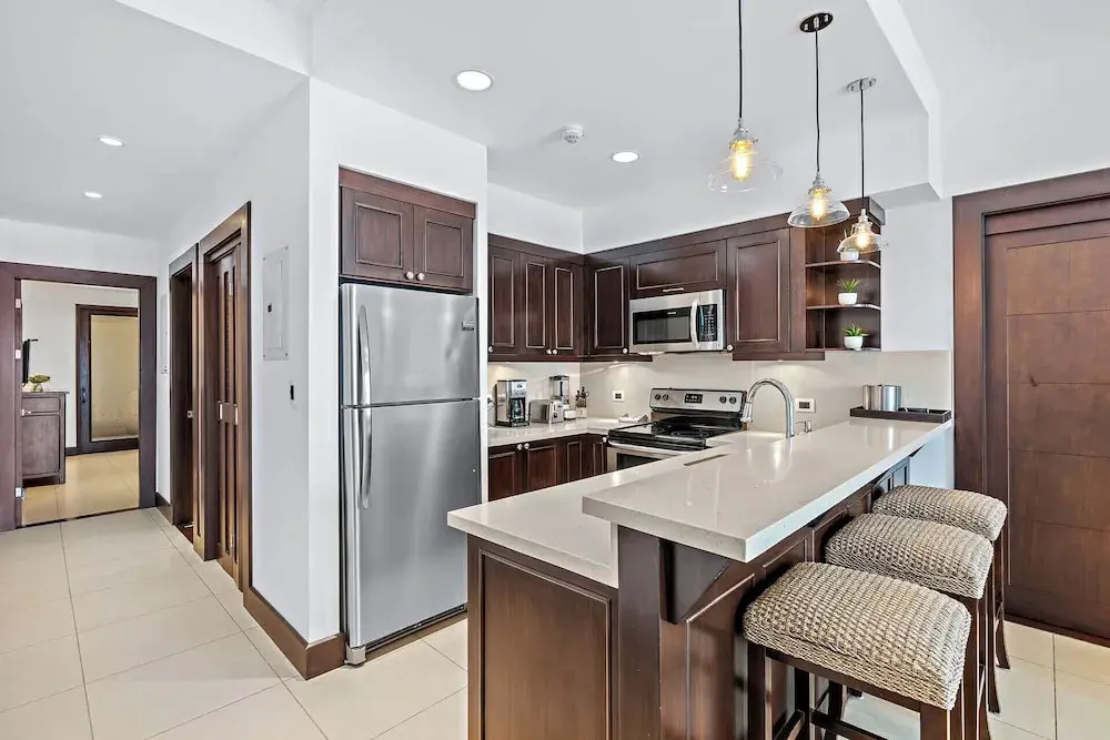 Luxury Condo with Panoramic Ocean Views, Sparkling Infinity Pool, and Modern Open-Concept Design