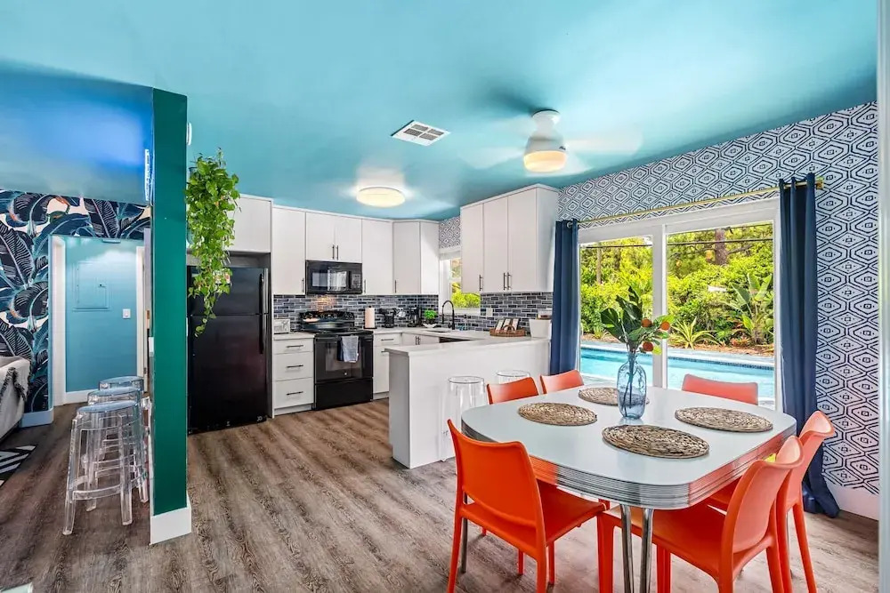 Eccentric Home With Pool Tiki hut Outdoor Kitchen