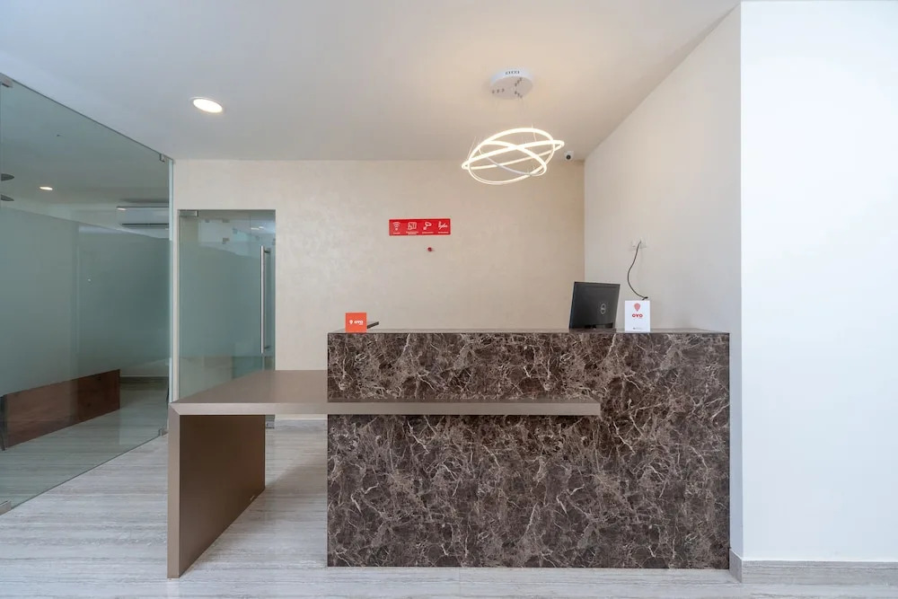 Capital O 18266 Hotel Arunaa Inn