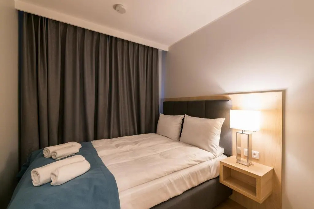 Q17 Apartments Rynek