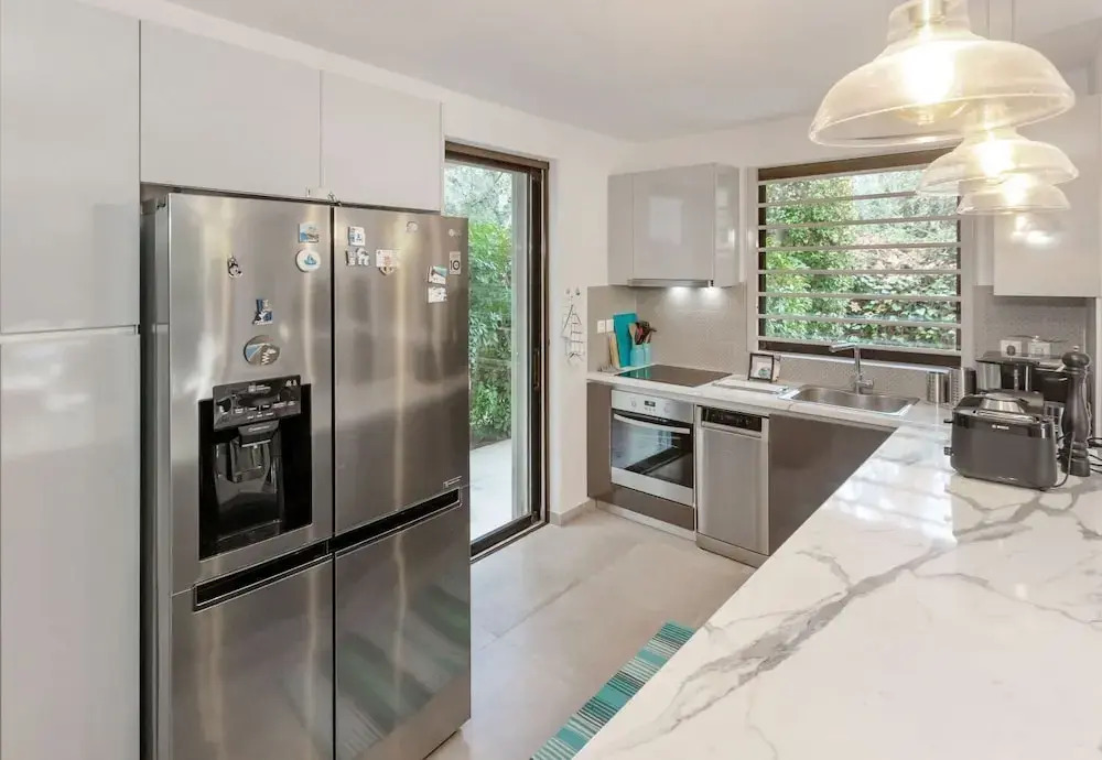 Private Garden Duplex in Voula by GHH