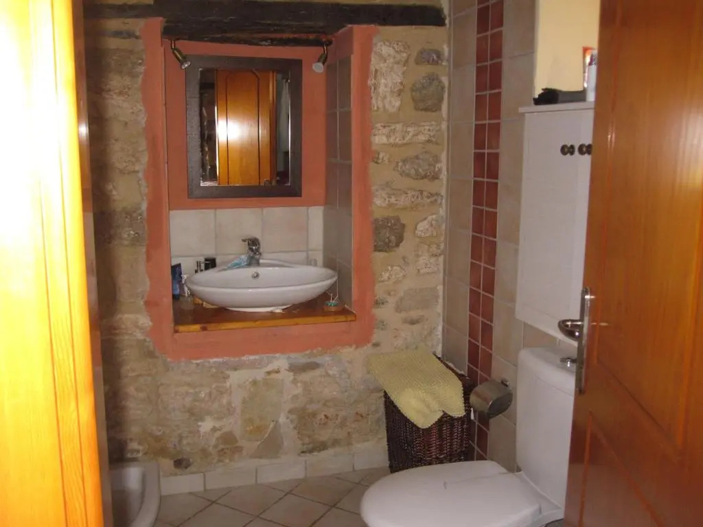 Traditional Greek Stone house by the sea