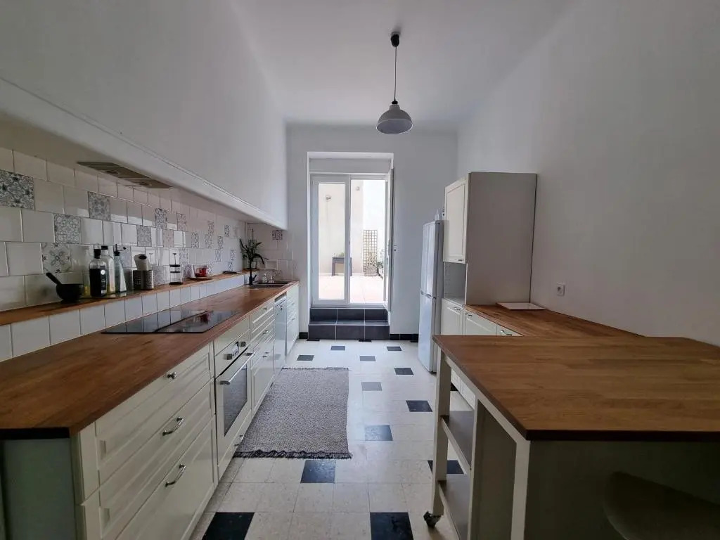 T4- terrasse 50m², garage, centre-ville