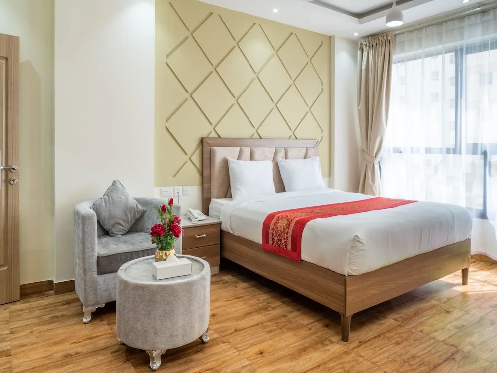 OYO Townhouse 156 Rose Hotel Apartments.