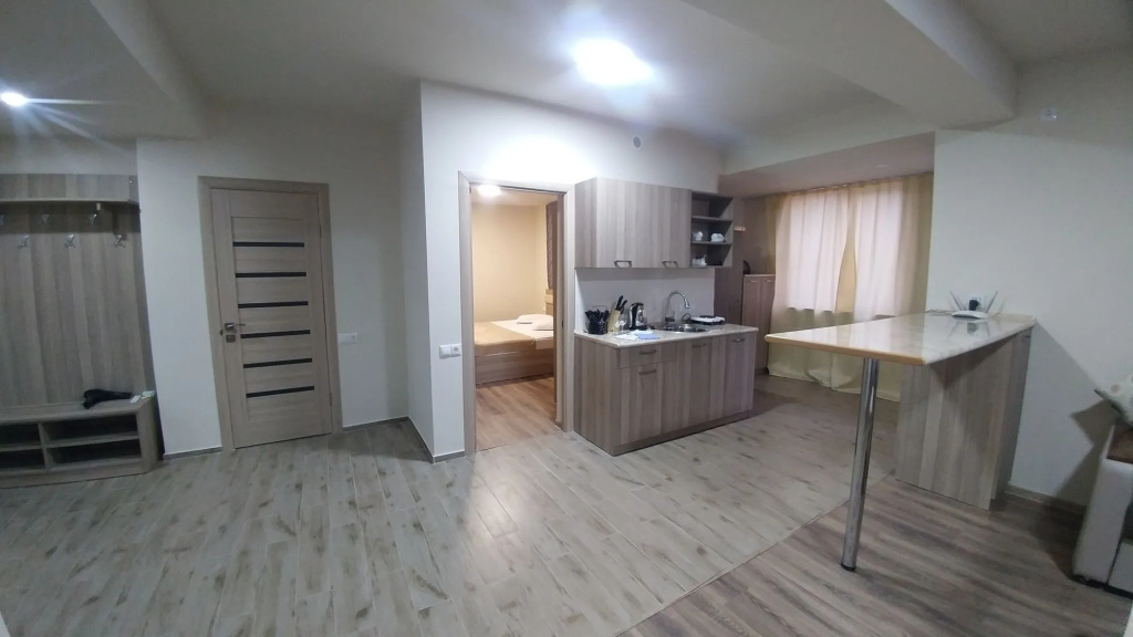 Отель Cross Apartments and Tours