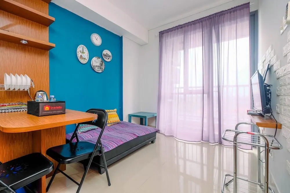 Homey and Comfortable 1BR Apartment at Royal Olive Residence