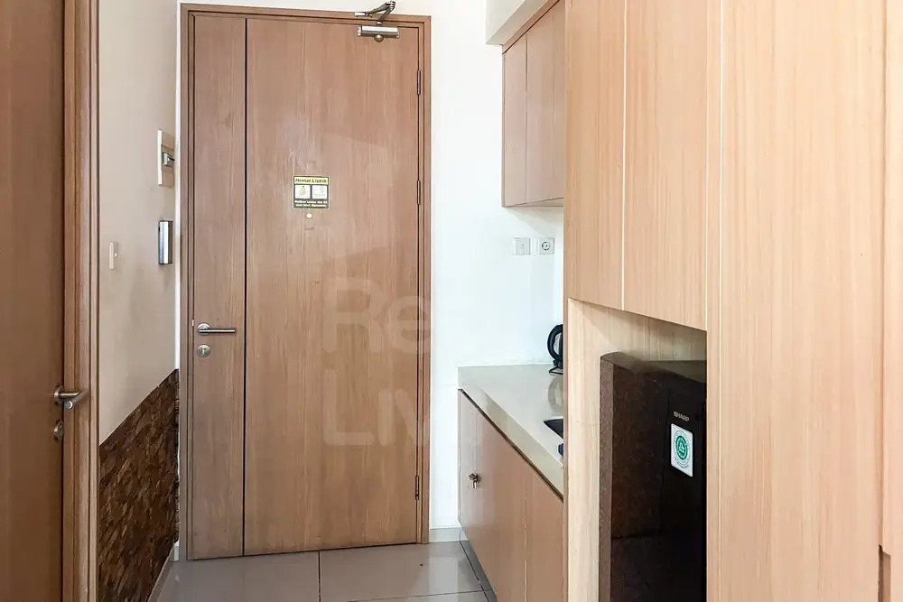 RedLiving Apartemen Treepark City - Nuansa Property Tower Alpine