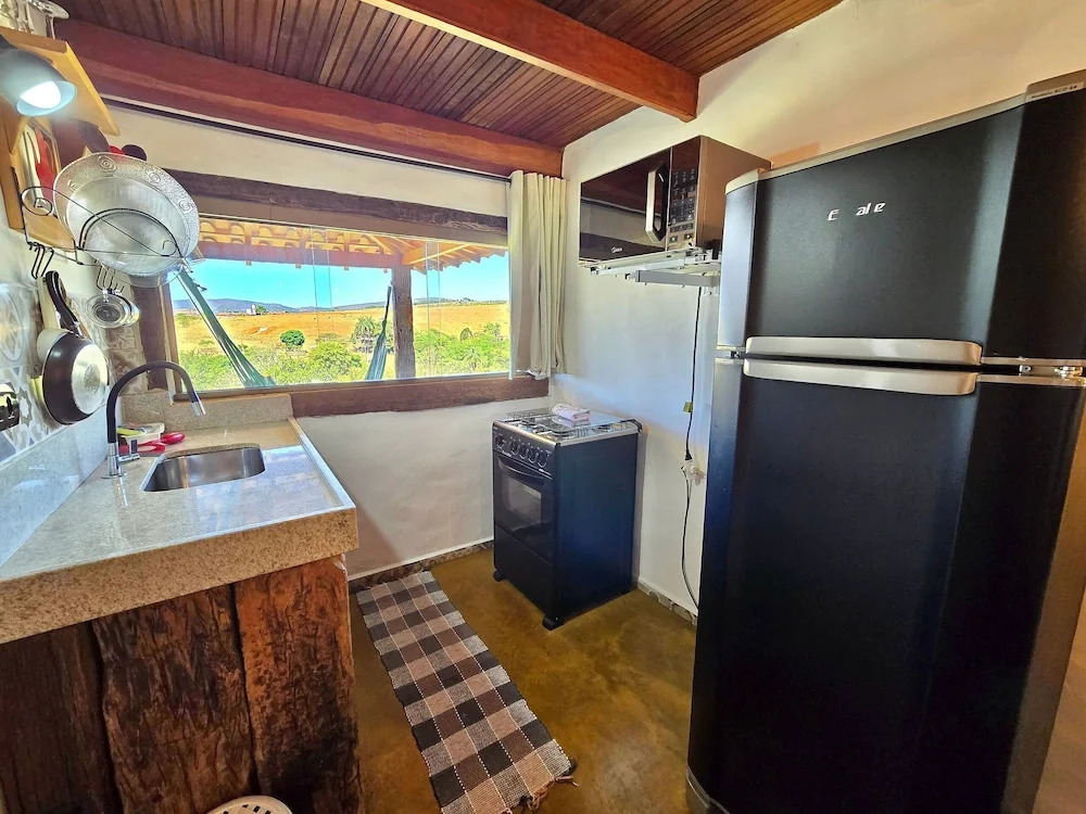 Chalés Vila Carrancas - Ao lado do centro com piscina, cozinha completa e muita tranquilidade