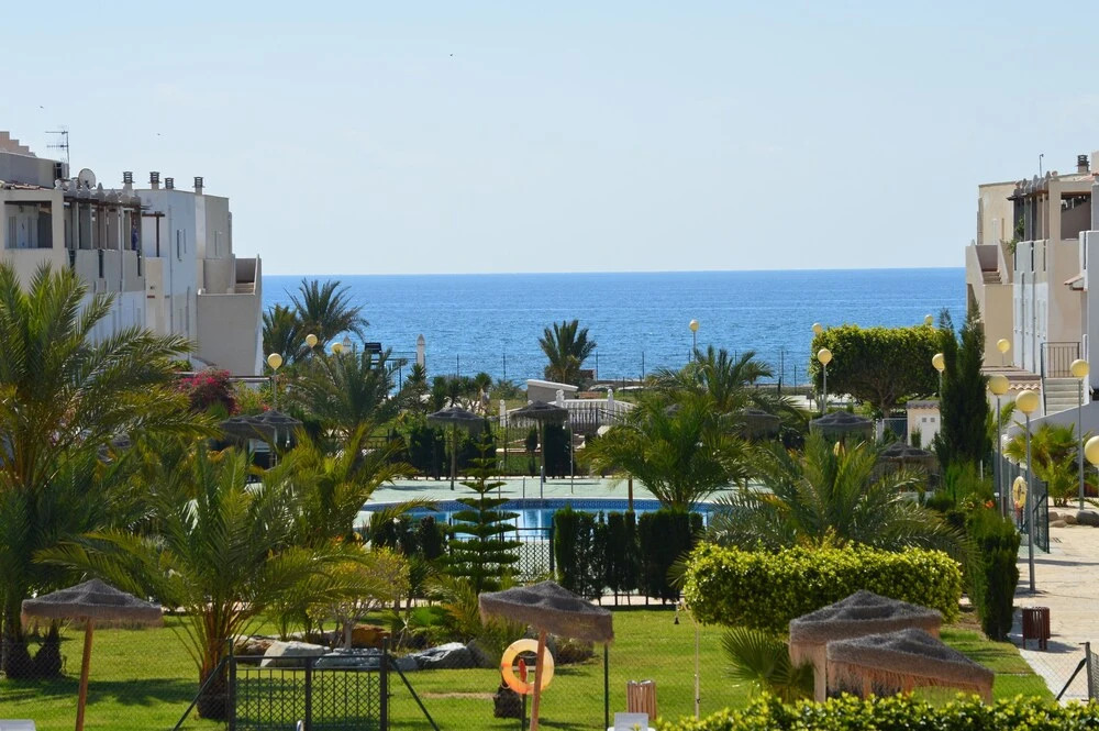 Ground floor apt facing the nudist beach, with private patio & East orientation