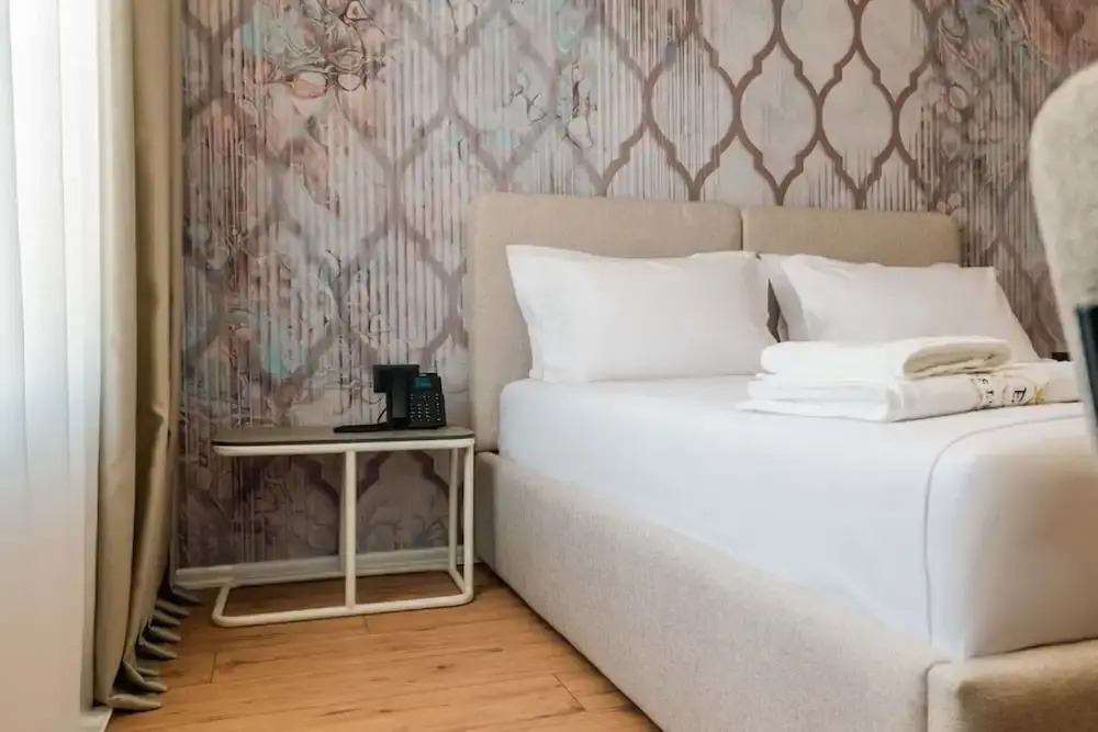 Ermes Deluxe Triple Room