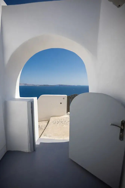 Three Domes Oia - an Iconic Collection