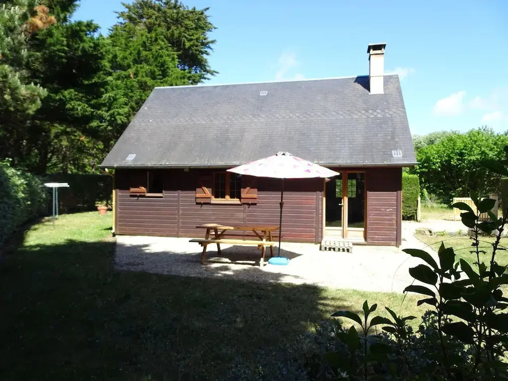 Wooden House by Beach Near Barneville