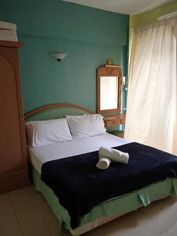 Santai Inn aprt 3 bilik Moslim Blok D w WiFi & Astro at Glory Beach Resort