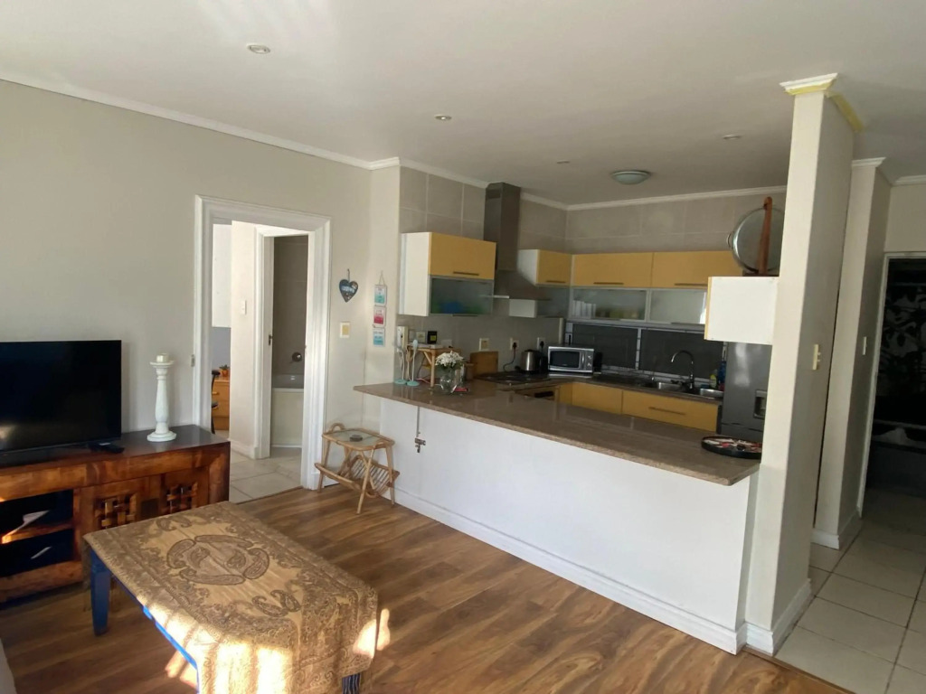 Cozy two bedroom unit in Strand with pool gym and laundromat