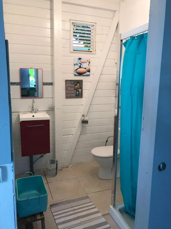 Appartement d'une chambre a Le Carbet a 1 m de la plage avec vue sur la mer jardin clos et wifi