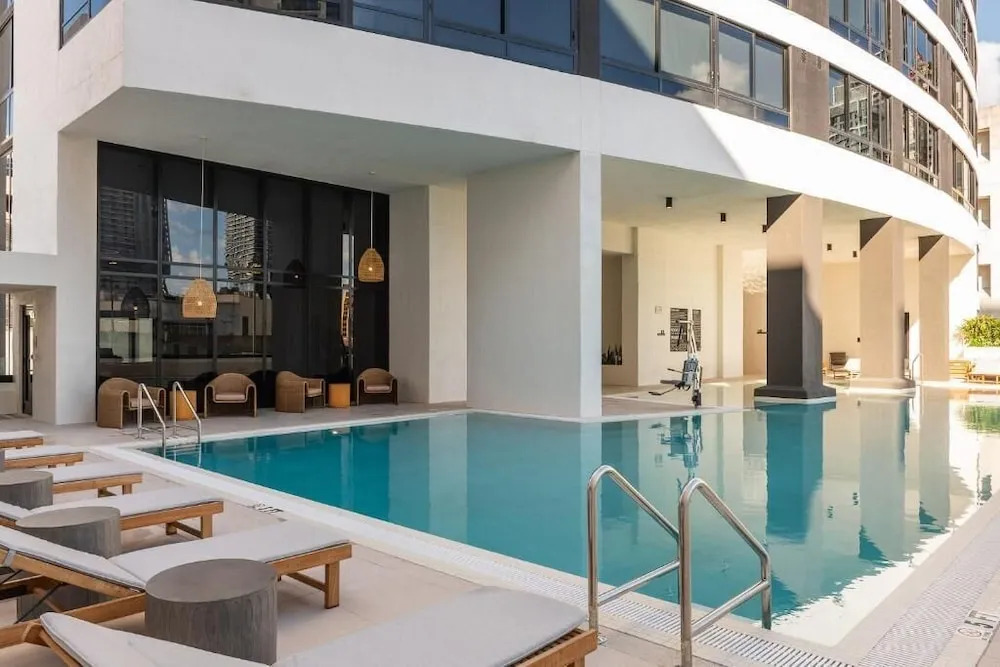 Sleek Escape-resort-style Stay With Pool & Parking