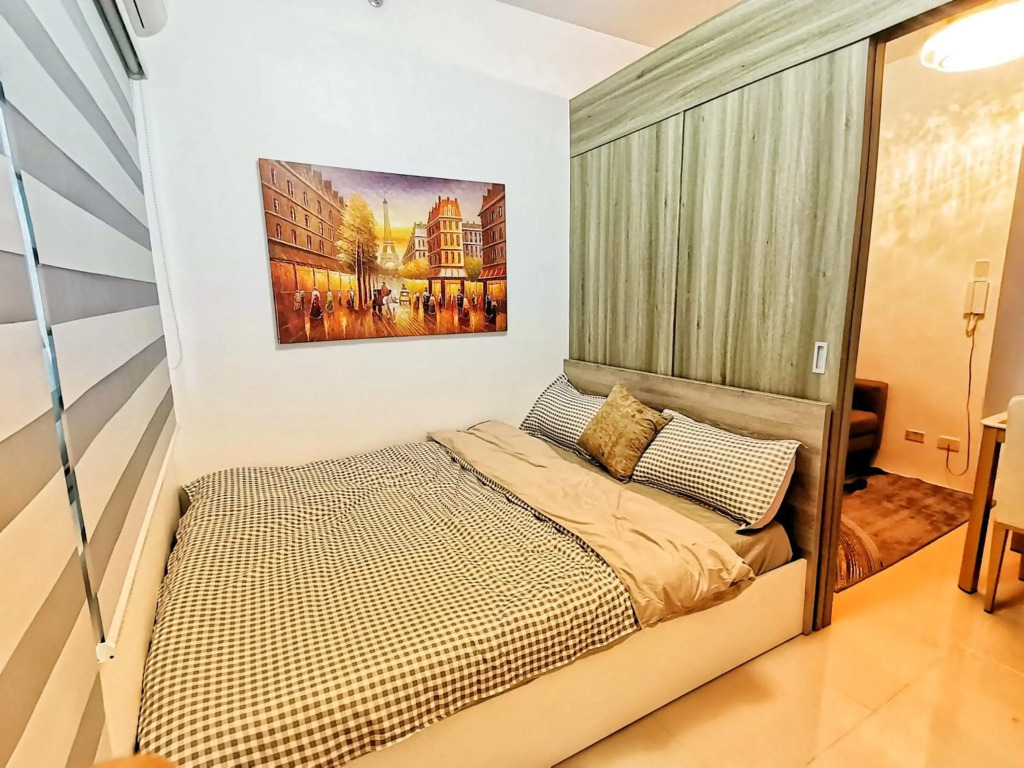 Stylish 1 Bedroom Condo Unit with Perfect Pool View Balcony at Fame Residences