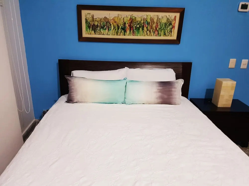 Comfortable 2 BR condo steps away from 5th Av and Mamitas Beach by Happy Address