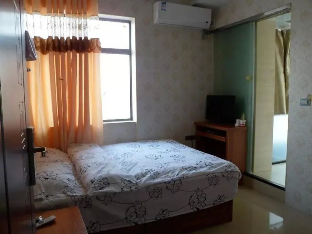 Jintaohong Taoyuan Hotel