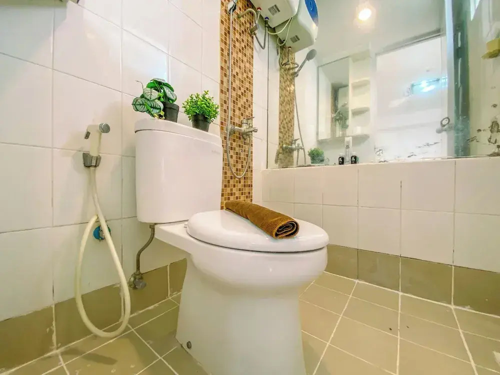 2BR with Cozy Style at Bassura City Apartment By Travelio