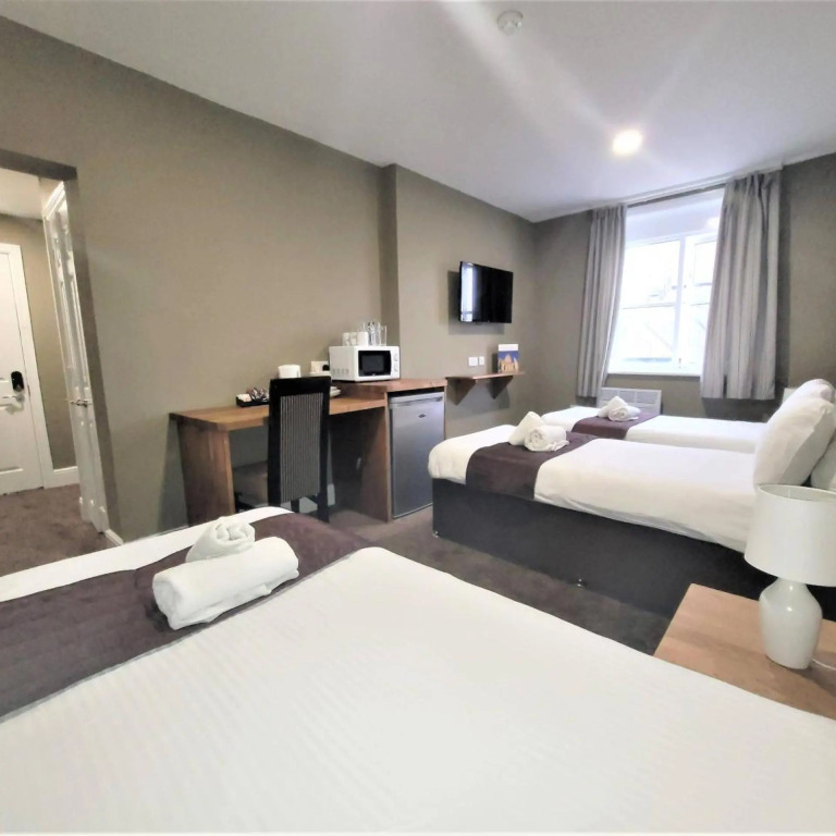 New County Hotel & Serviced Apartments by RoomsBooked