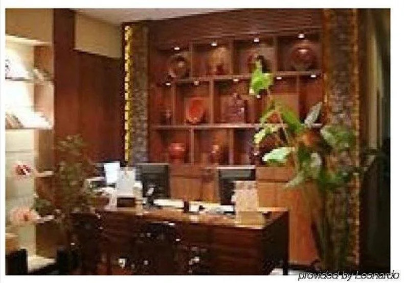 Baolong Homelike Hotel (Wujiaochang Branch)