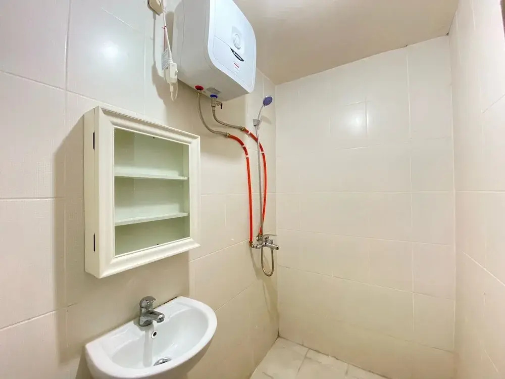 Cozy 2BR at Pinewood Apartment By Travelio